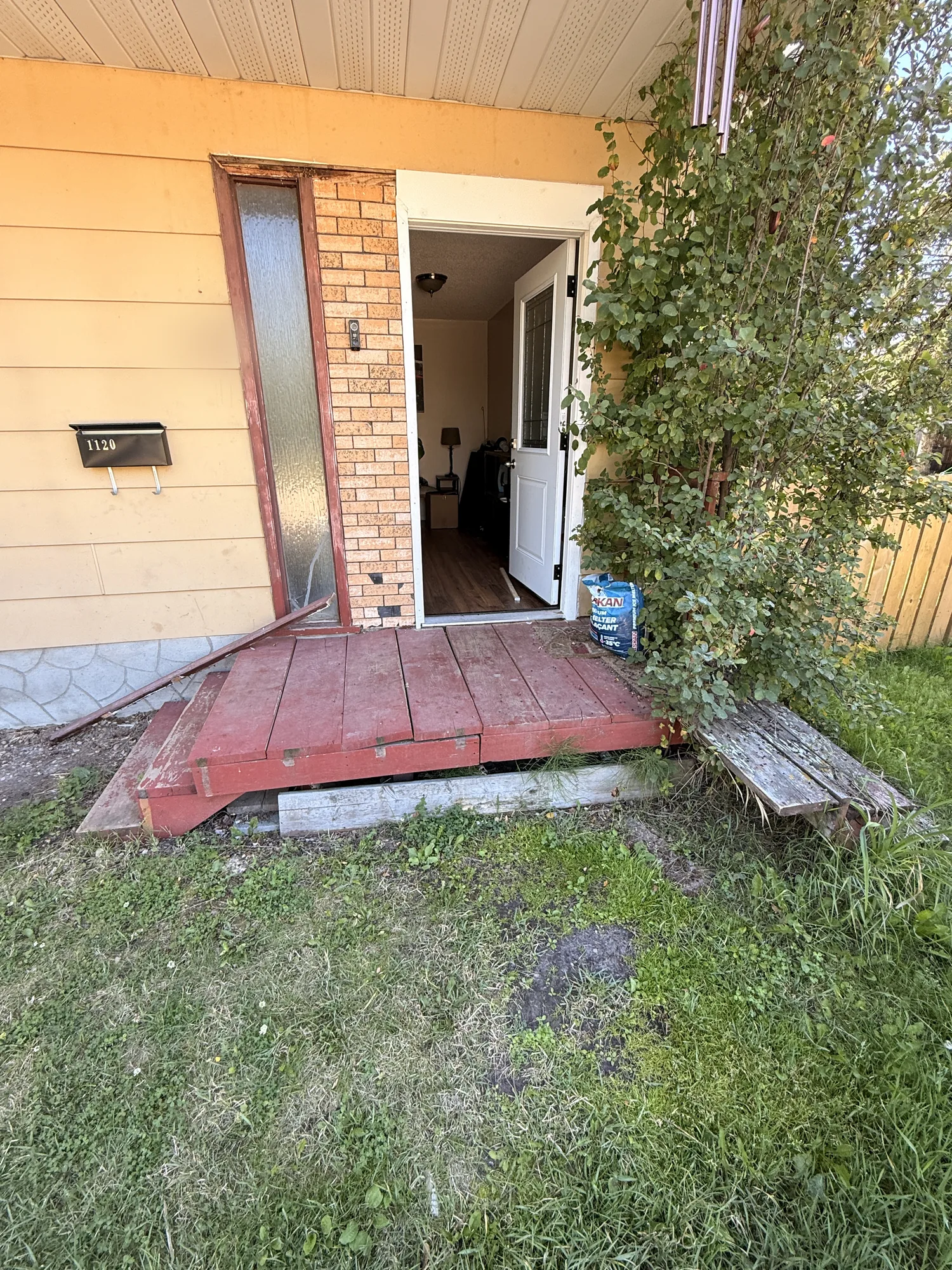 The old porch from the side with the front door open