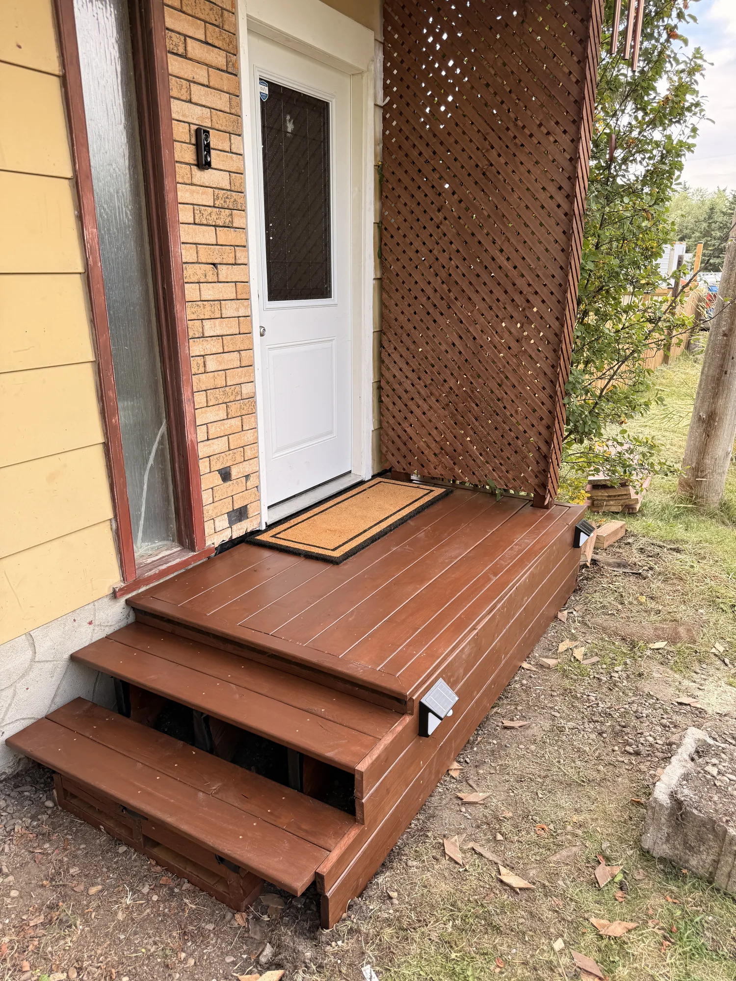 The finished steps and deck with the solar lights in the risers