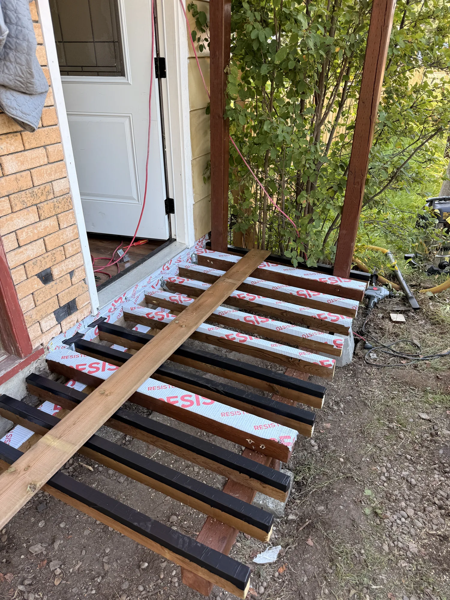 All the joists in place with protective tape along the tops