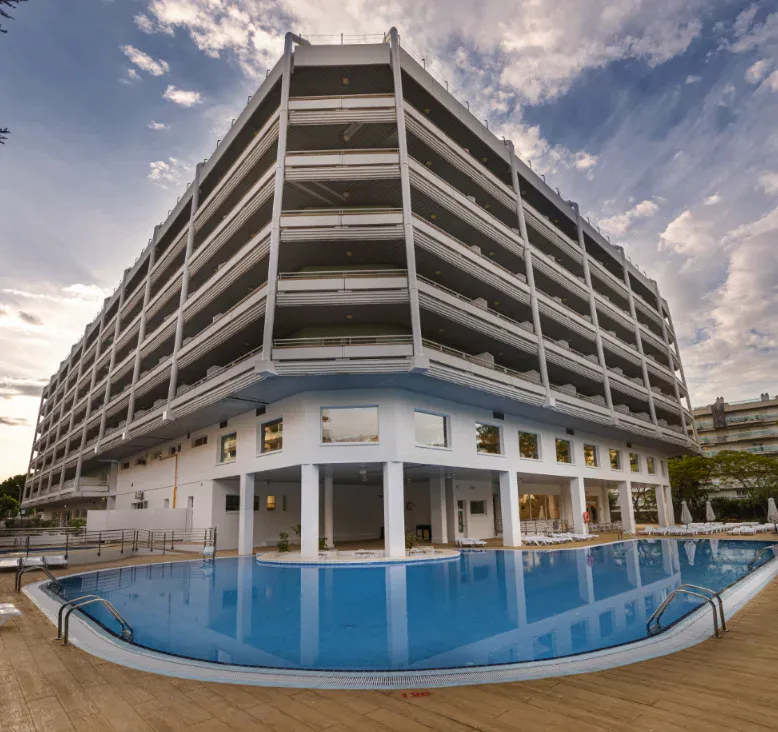 Swimming pool point of view, looking back at the hotel