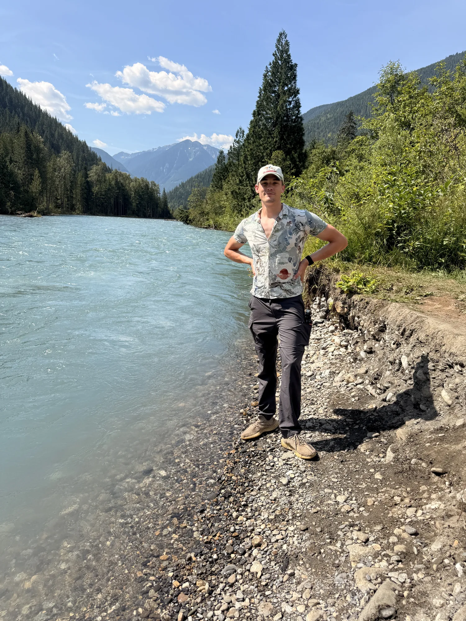 Standing on the gravel bank of a glacial river near the Skunk Cabbage boardwalk