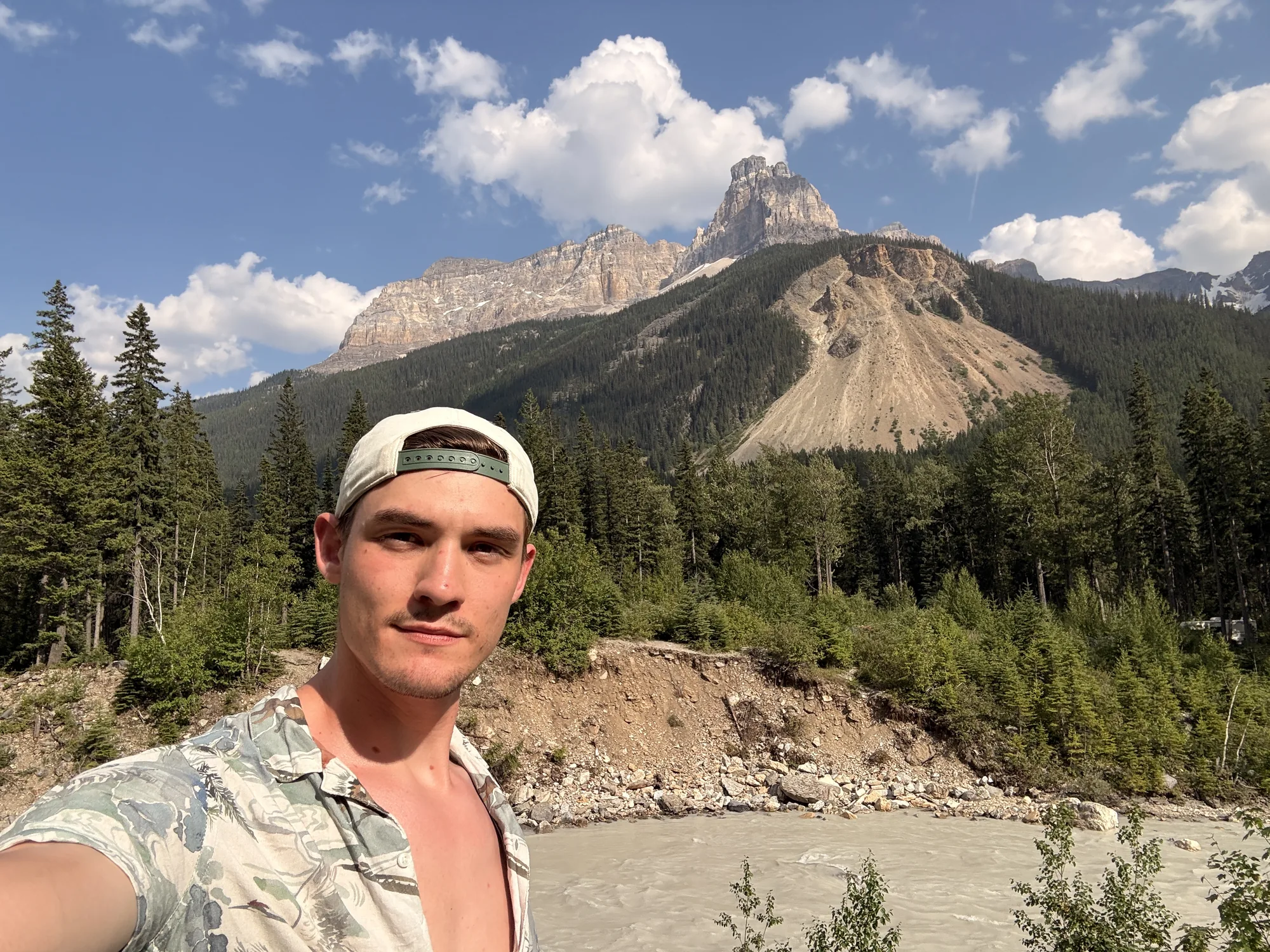 Cathedral Mountain rising above the glacial river in Yoho National Park