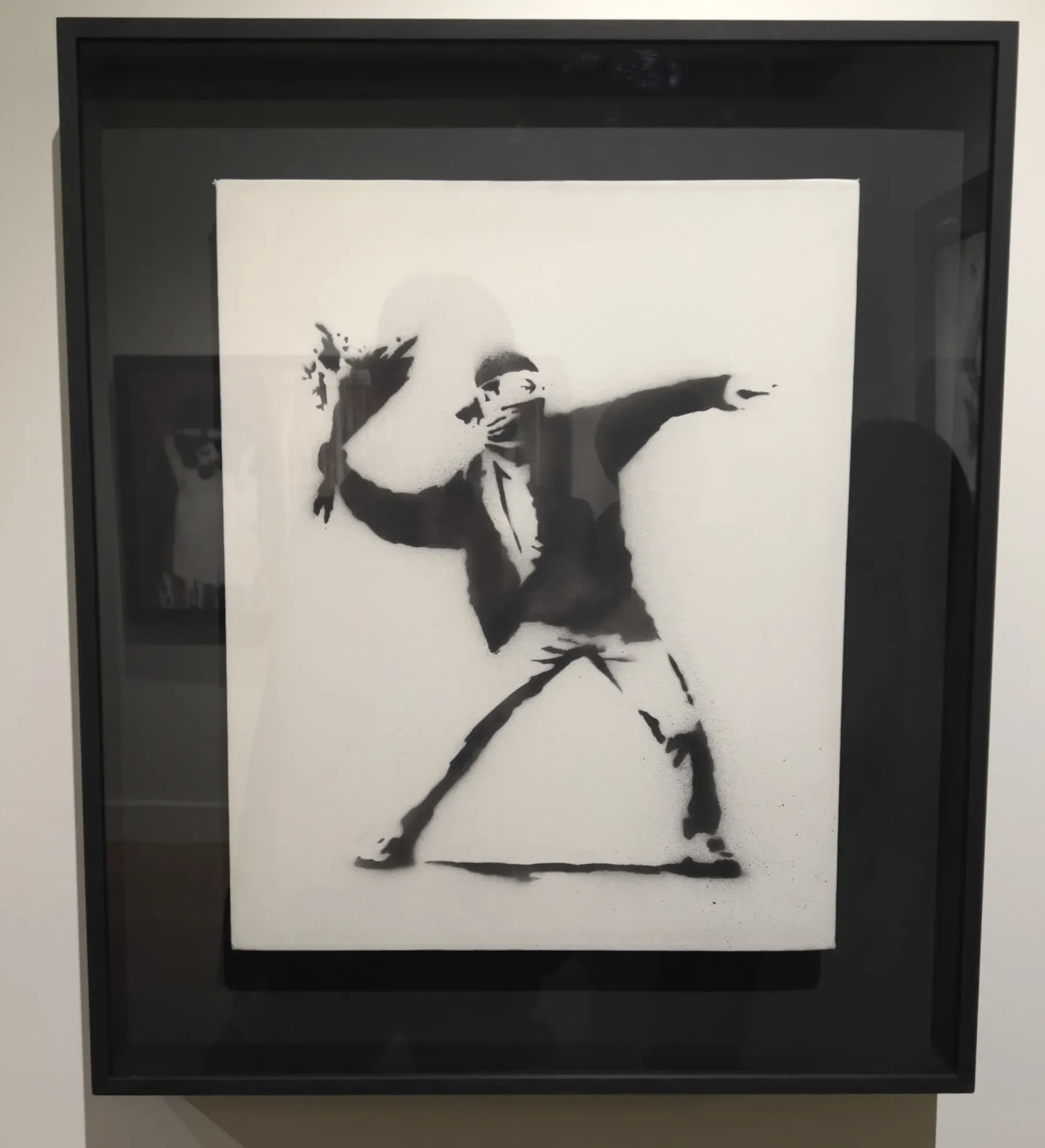 Banksy Flower Thrower style artwork in the museum