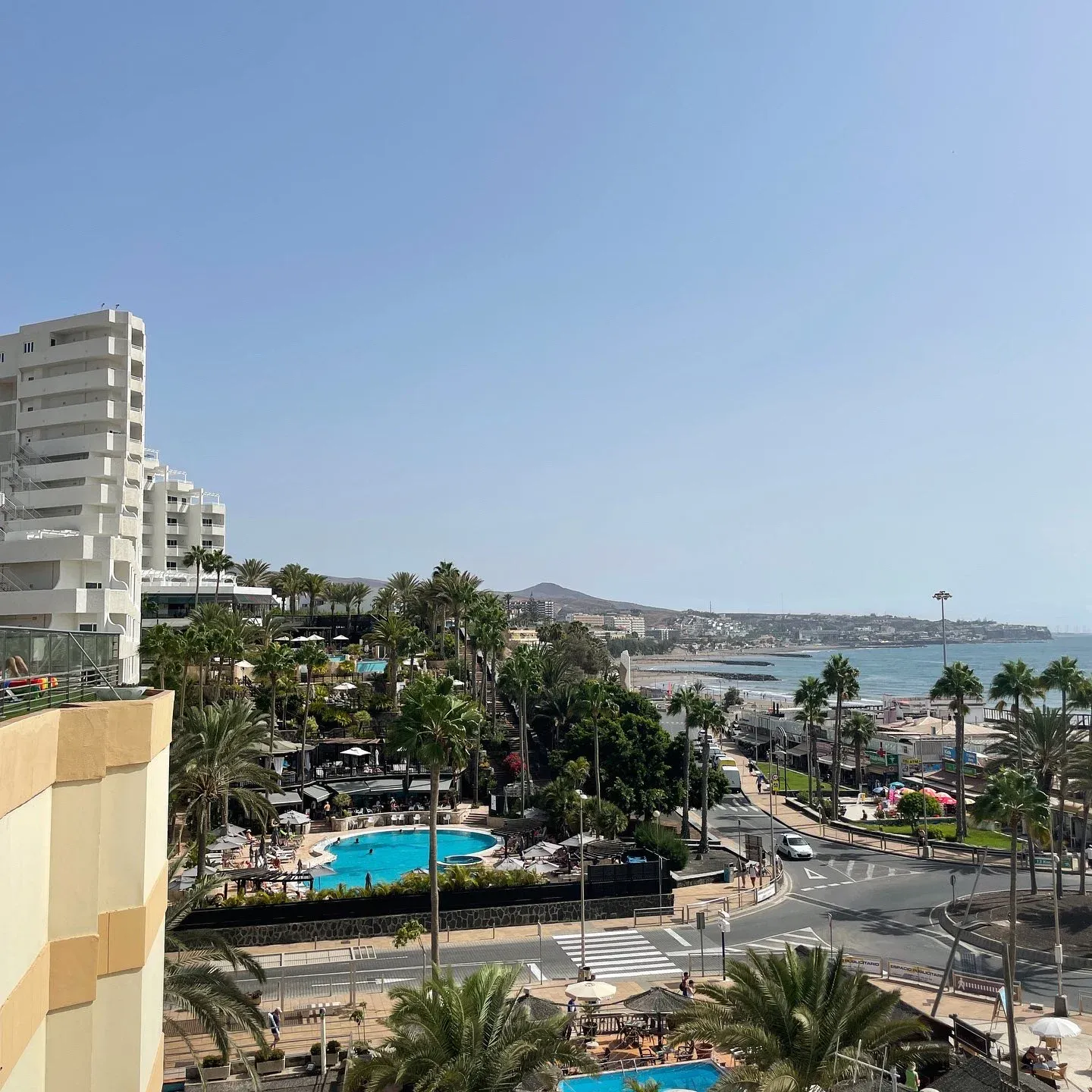 Hotel-style balconies against a cloudy sky in Gran Canaria